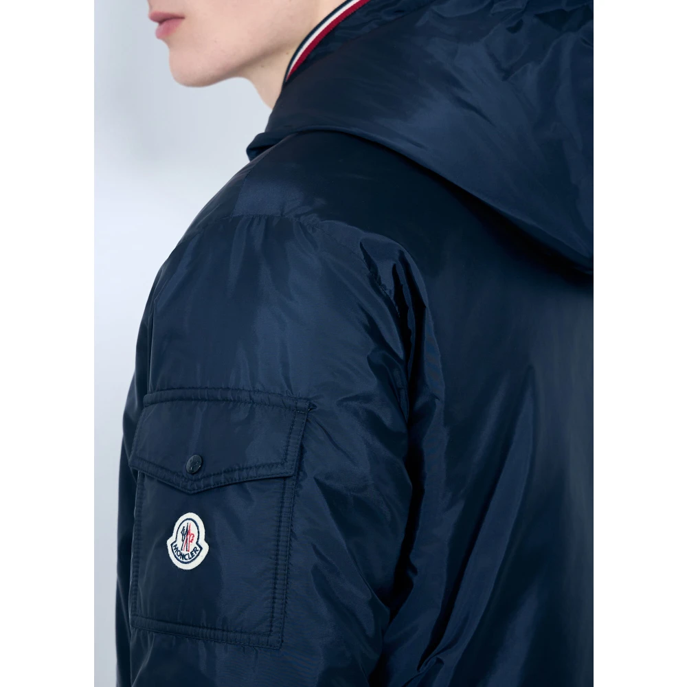 Moncler Waterafstotende gewatteerde jas met capuchon en afwerking Blue Heren