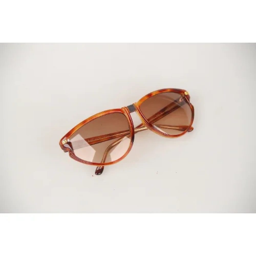 Givenchy Pre-owned Plastic sunglasses Brown Dames