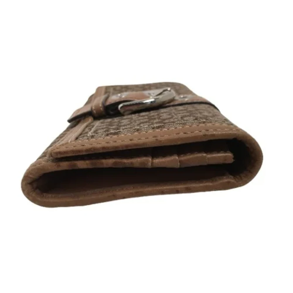 Coach Pre-owned Fabric clutches Brown Dames