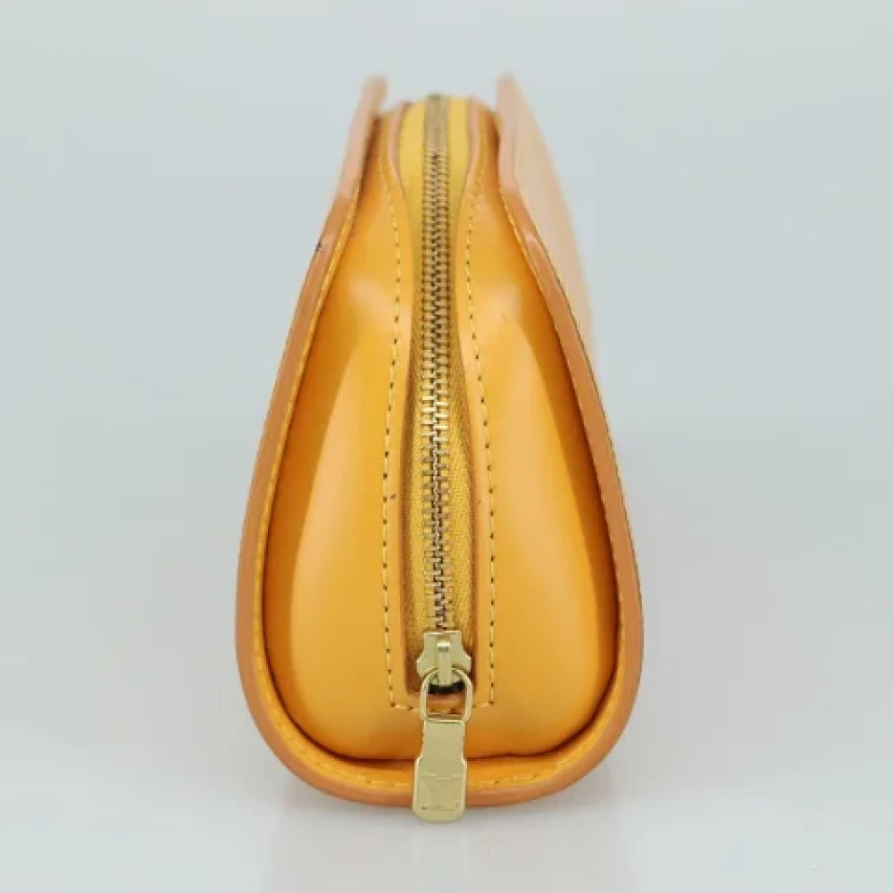 Louis Vuitton Vintage Pre-owned Leather pouches Yellow Dames