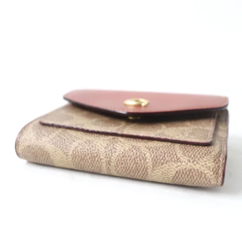 Coach Pre-owned Canvas wallets Brown Dames