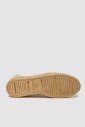 witte-sneaker-met-metalen-accenten