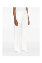 beach-wave-white-trousers