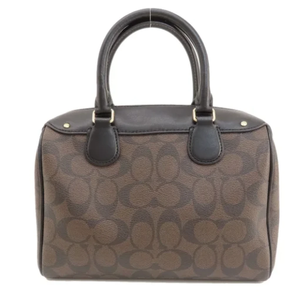 Coach Pre-owned Plastic handbags Brown Dames