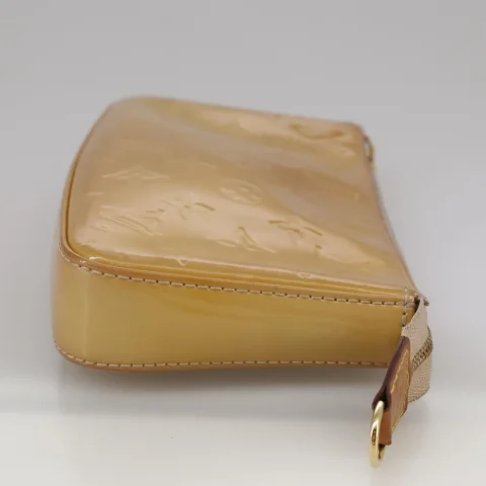 Louis Vuitton Vintage Pre-owned Leather pouches Beige Dames