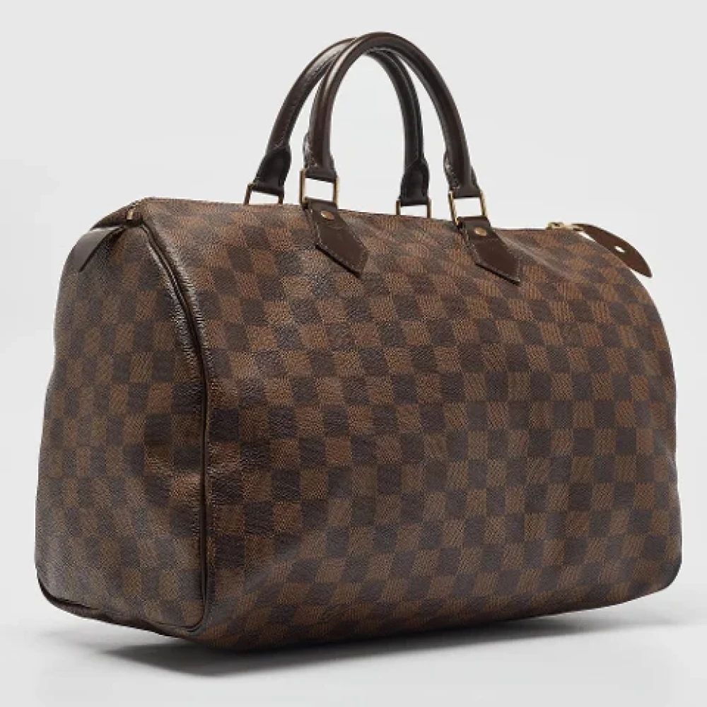 Louis Vuitton Vintage Pre-owned Coated canvas handbags Brown Dames