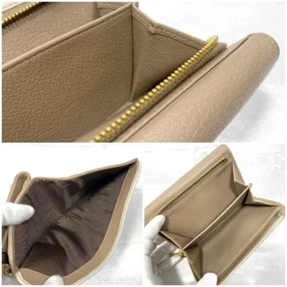 Miu Pre-owned Leather wallets Beige Dames