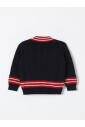 pull-enfant-bleu-avec-finitions-cotelees