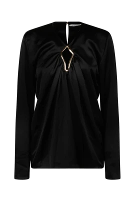 Svart blus med metalldetaljer
