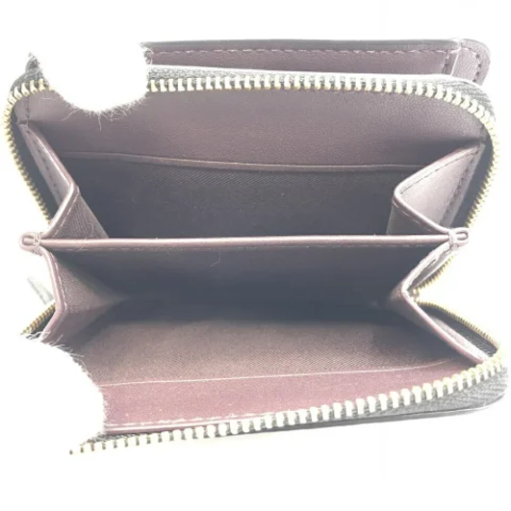 Coach Pre-owned Leather wallets Black Dames