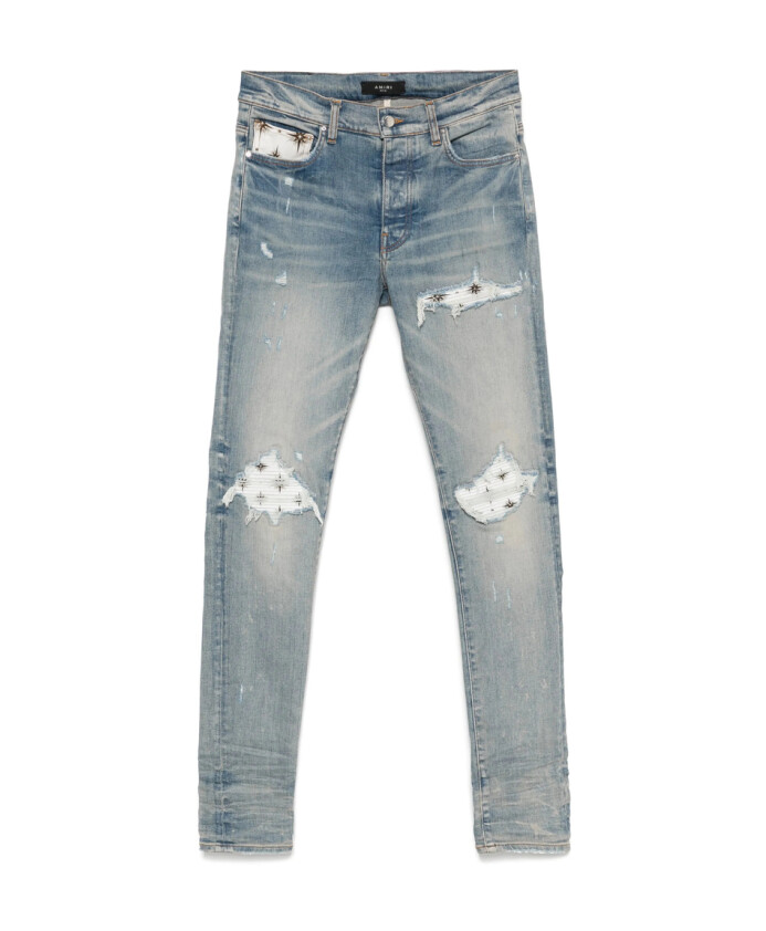 light-blue-ripped-jeans-with-button-fly