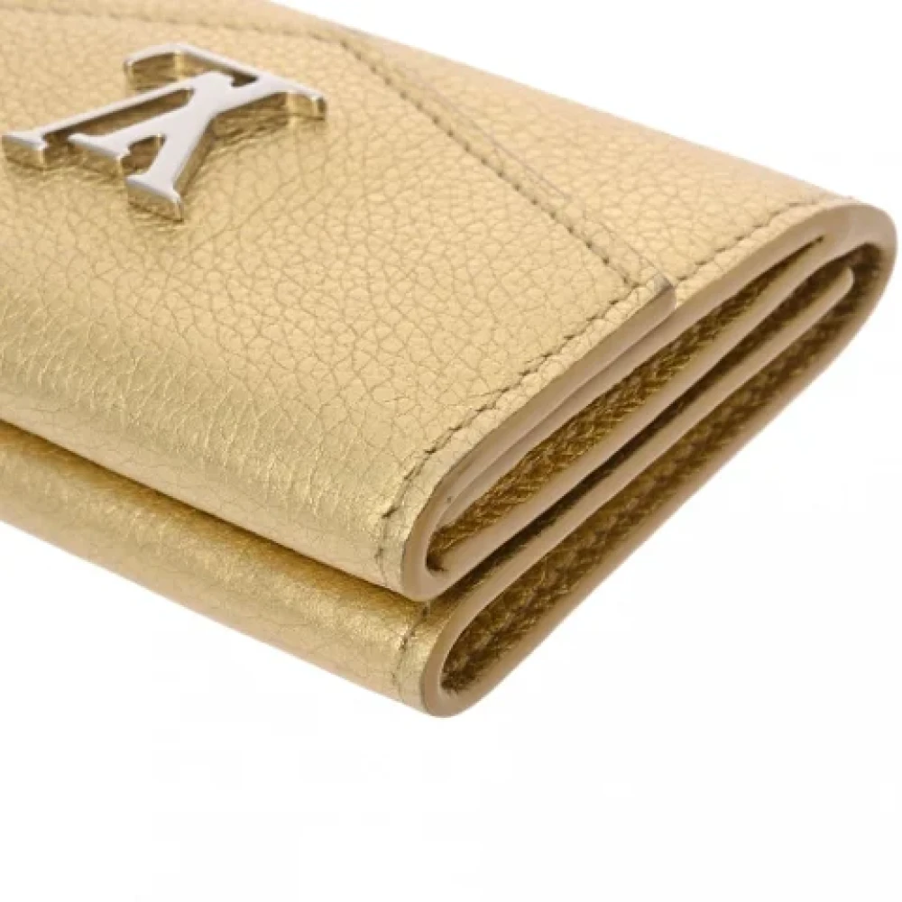 Louis Vuitton Vintage Pre-owned Leather wallets Yellow Dames