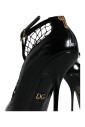 talons-en-cuir-noir-avec-fermeture-a-boucle