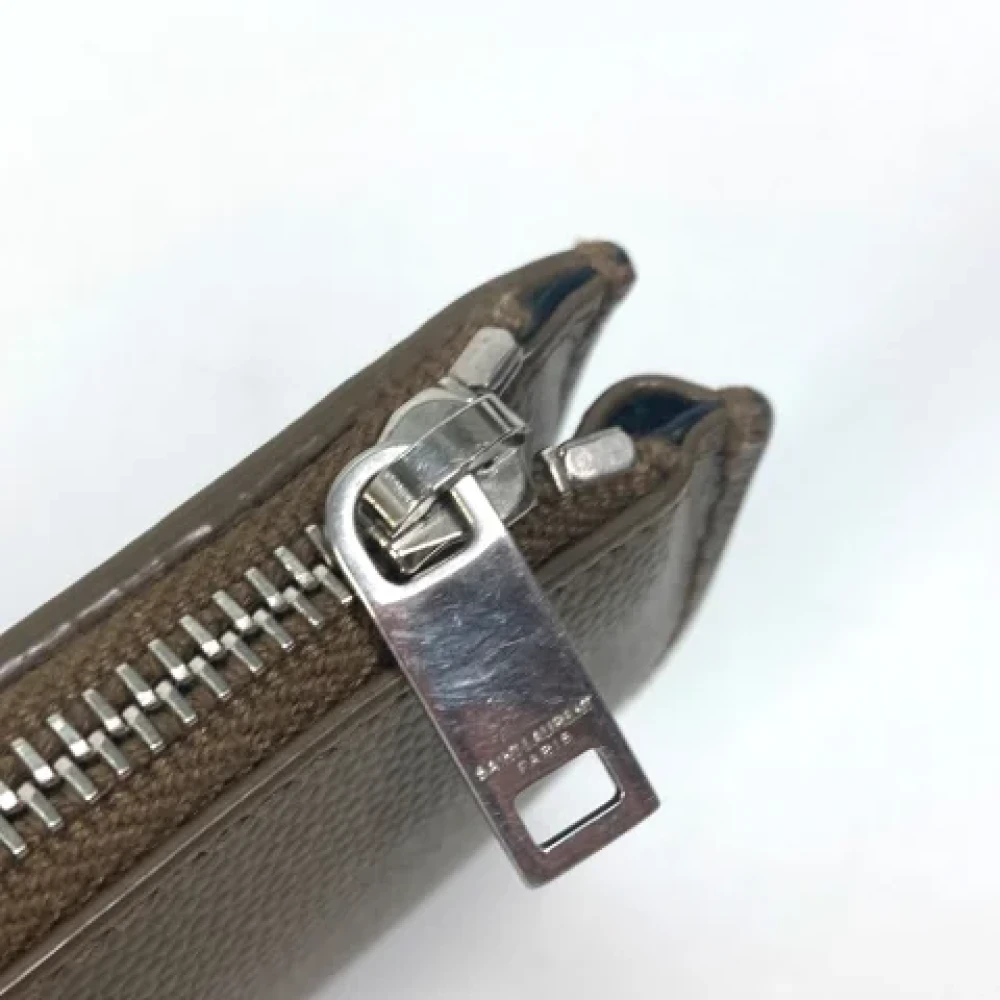Yves Saint Laurent Vintage Pre-owned Leather wallets Brown Heren