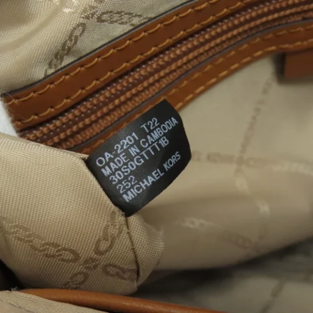 Michael Kors Pre-owned Fabric shoulder-bags Brown Dames