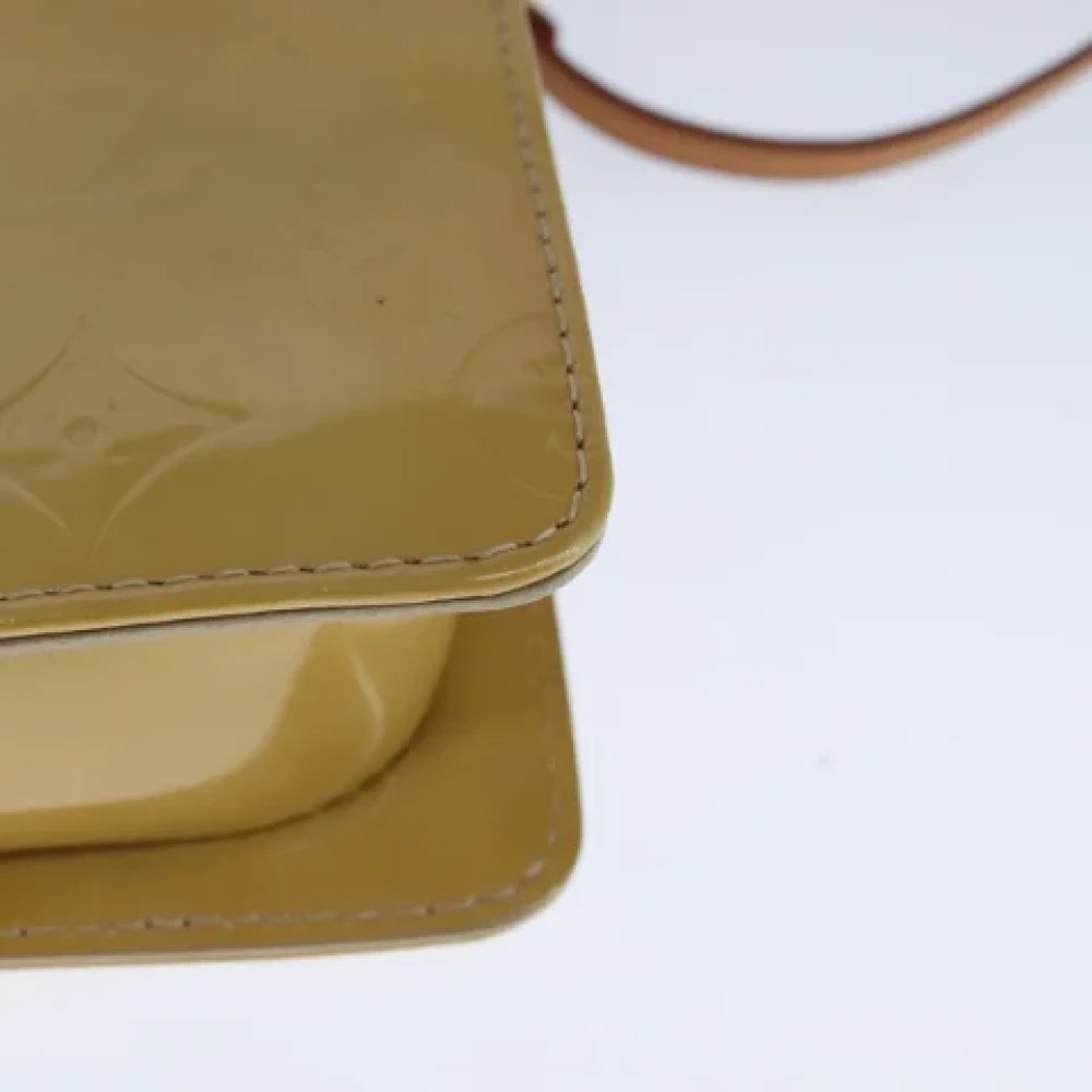 Louis Vuitton Vintage Pre-owned Leather clutches Beige Dames