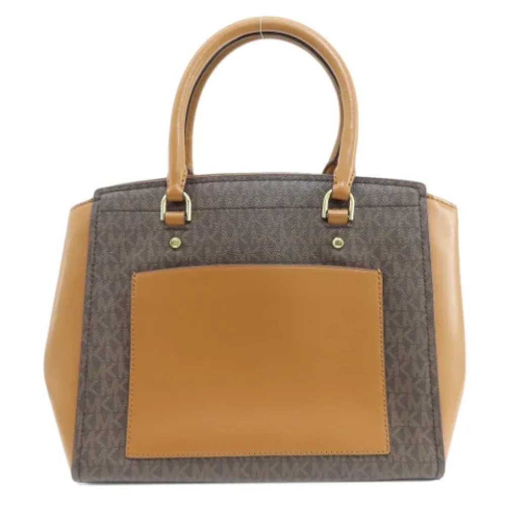 Michael Kors Pre-owned Plastic totes Brown Dames