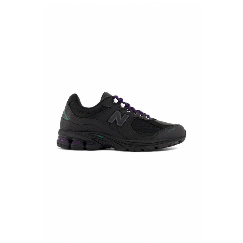 New Balance Leren sneakers met technische stofinzetten Heren Schoenen Zwart