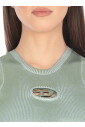 green-sleeveless-top-with-metal-logo