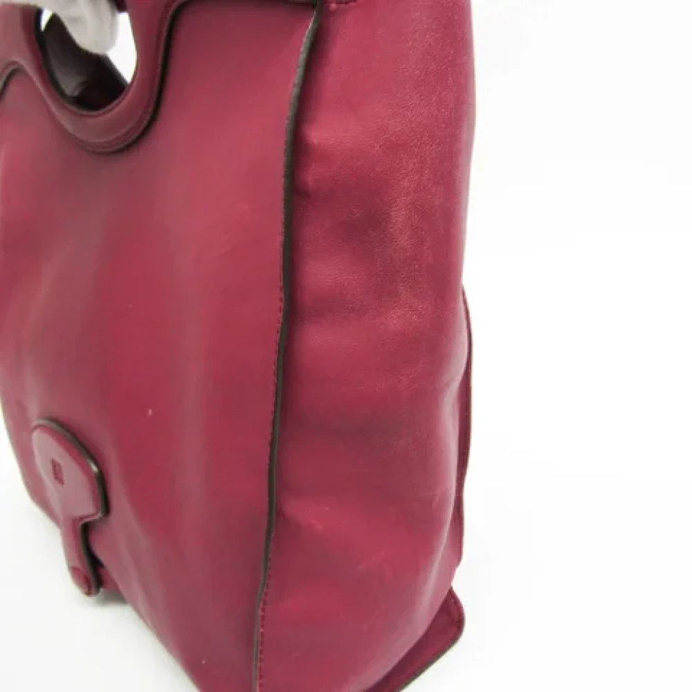 Loewe Pre-owned Leather clutches Red Dames