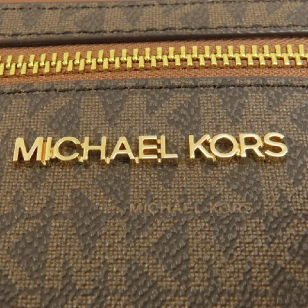 Michael Kors Pre-owned Canvas shoulder-bags Brown Dames