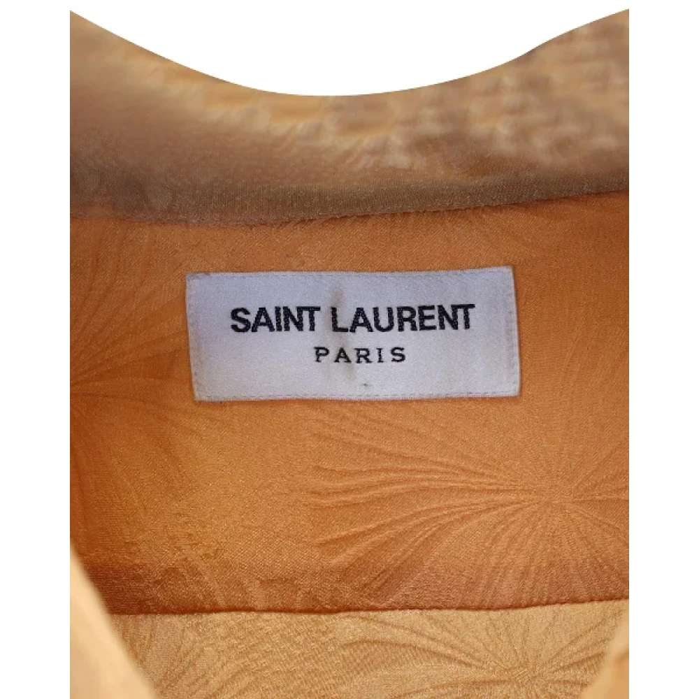Saint Laurent Vintage Pre-owned Silk tops Orange Dames