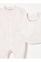 combi-pilote-beige-et-bavoir-ensemble