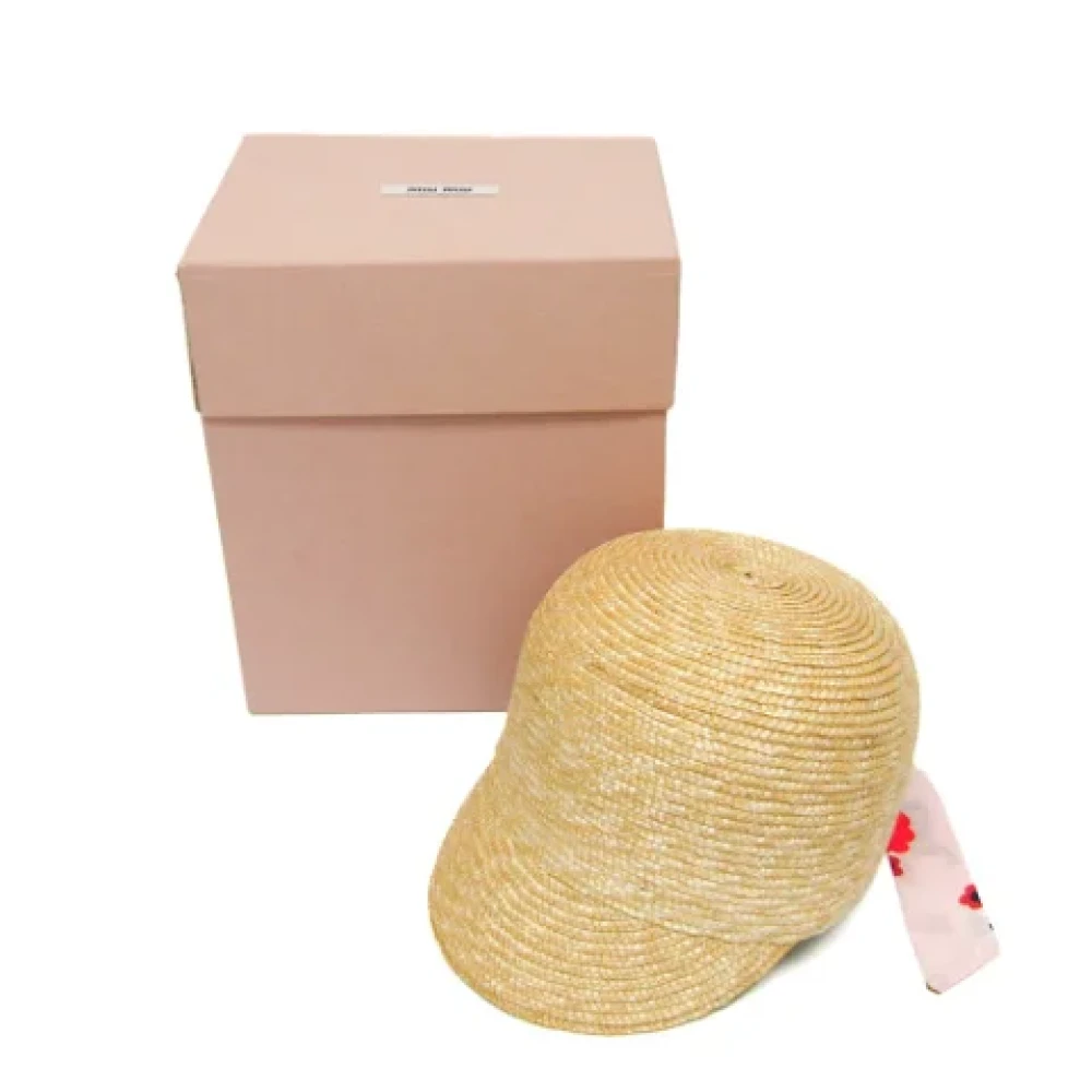 Miu Pre-owned Fabric hats Beige Dames