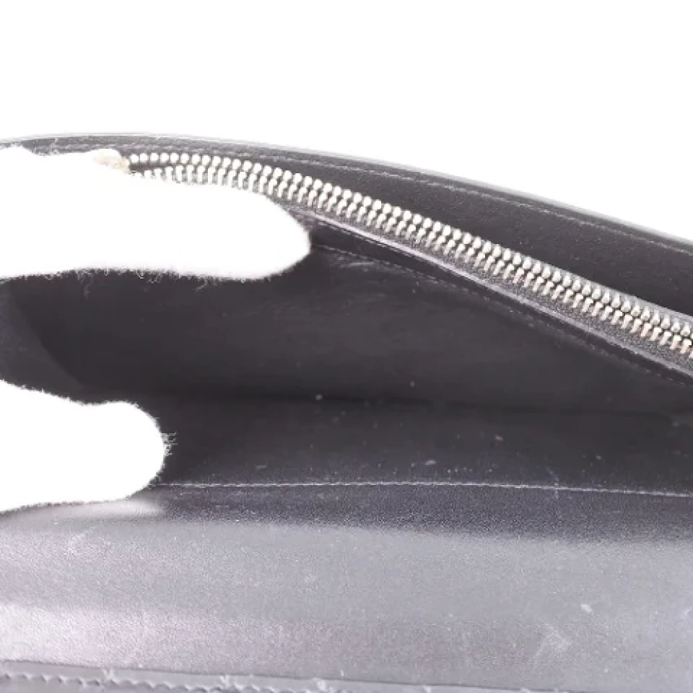 Yves Saint Laurent Vintage Pre-owned Leather wallets Black Heren