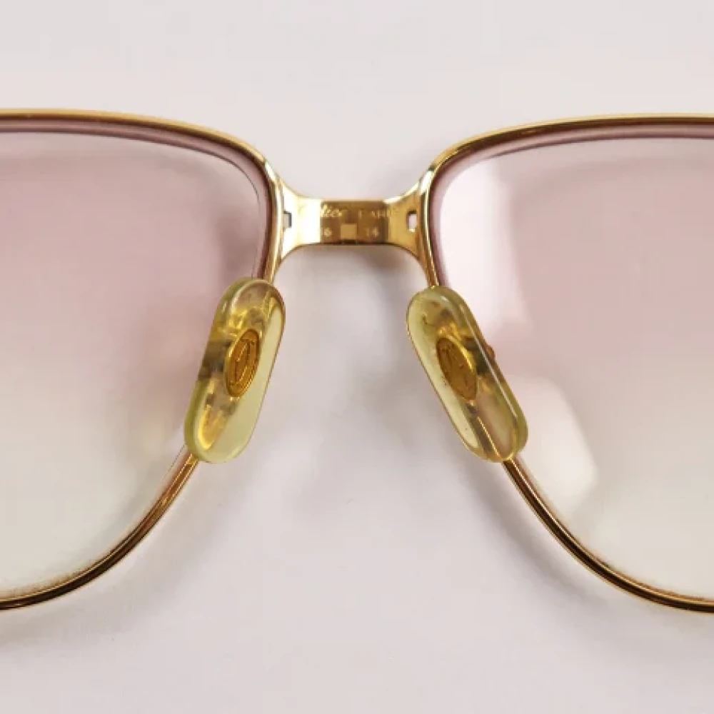 Cartier Vintage Pre-owned Metal sunglasses Yellow Heren