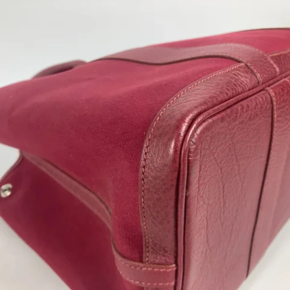 Hermès Vintage Pre-owned Fabric shoulder-bags Red Dames