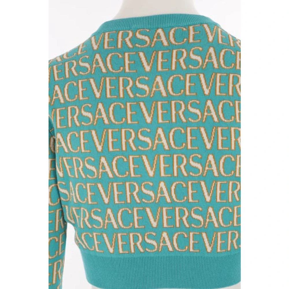 Versace Jacquard Korte Cardigan in Blauw Ivoor en Brons Blue Dames