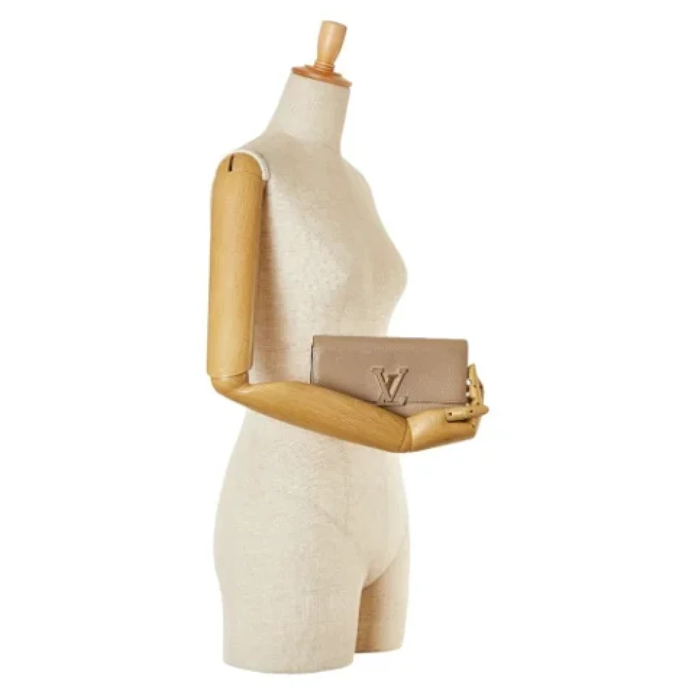 Louis Vuitton Vintage Pre-owned Leather wallets Beige Dames