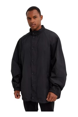 black-windbreaker-with-logo-stamp