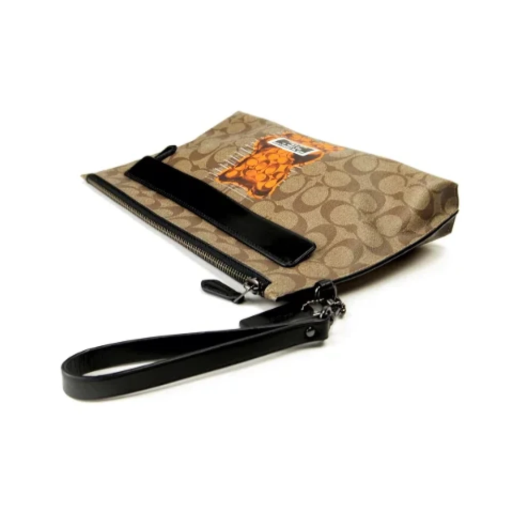 Coach Pre-owned Canvas clutches Brown Dames