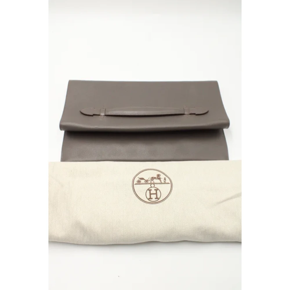 Hermès Vintage Pre-owned Leather clutches Gray Dames