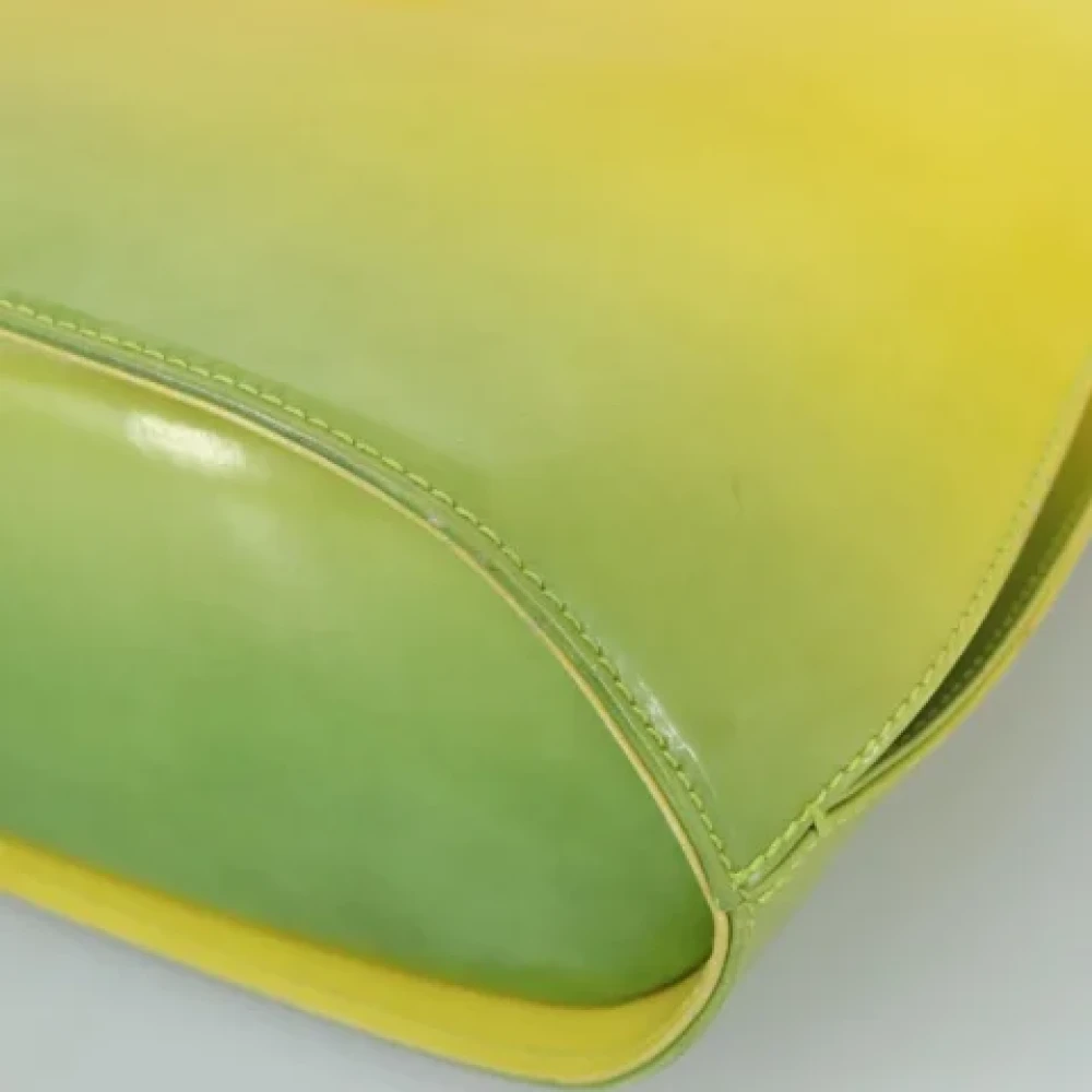 Salvatore Ferragamo Pre-owned Canvas handbags Yellow Dames