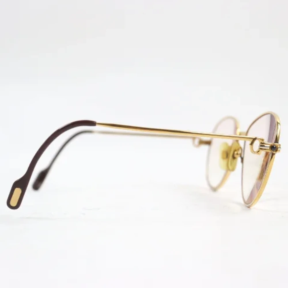 Cartier Vintage Pre-owned Metal sunglasses Yellow Dames