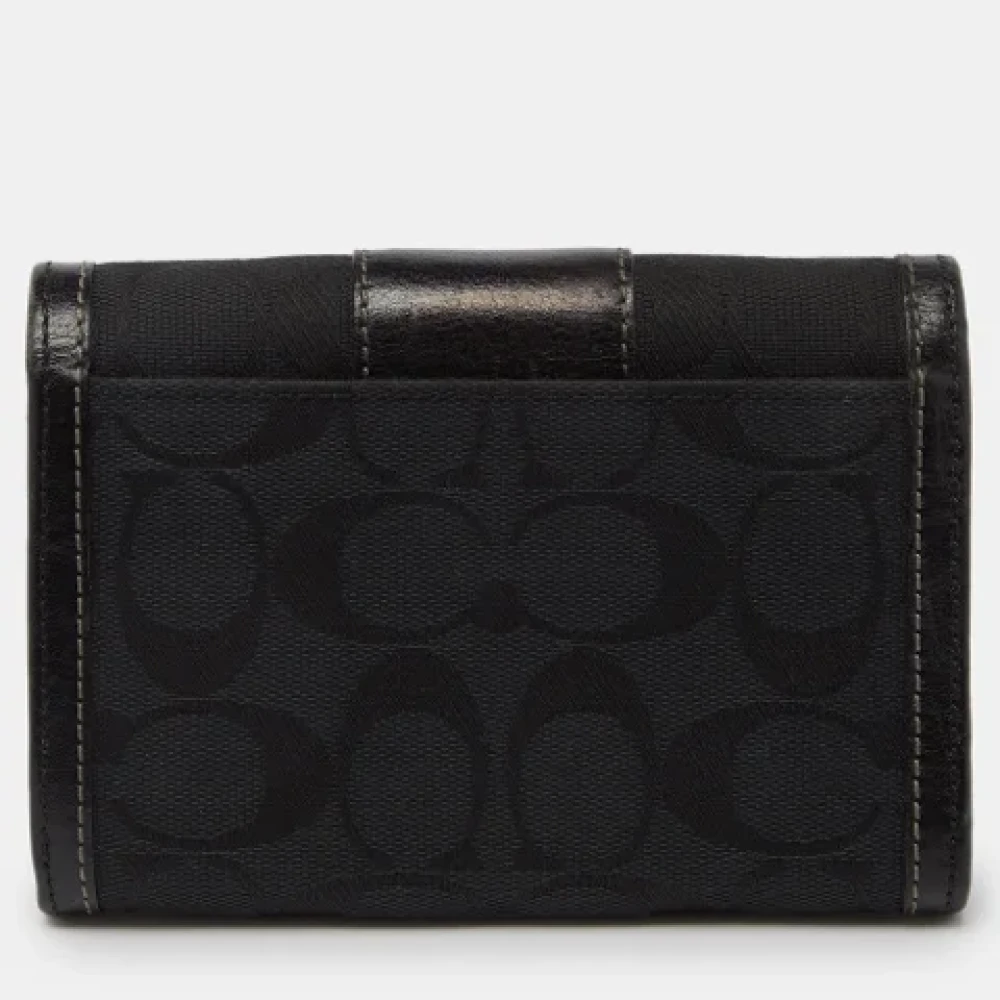 Coach Pre-owned Canvas wallets Black Dames