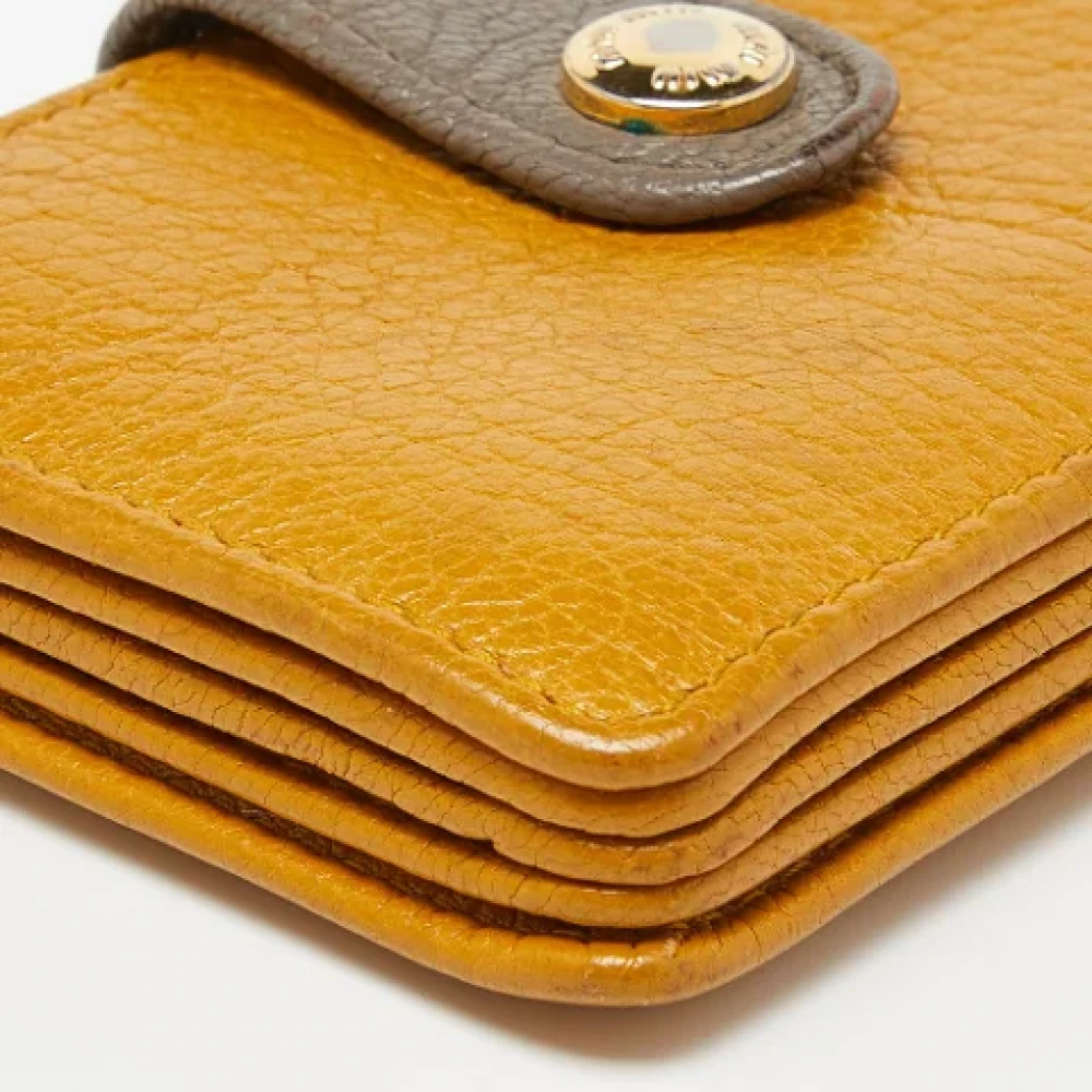 Miu Pre-owned Leather wallets Yellow Dames