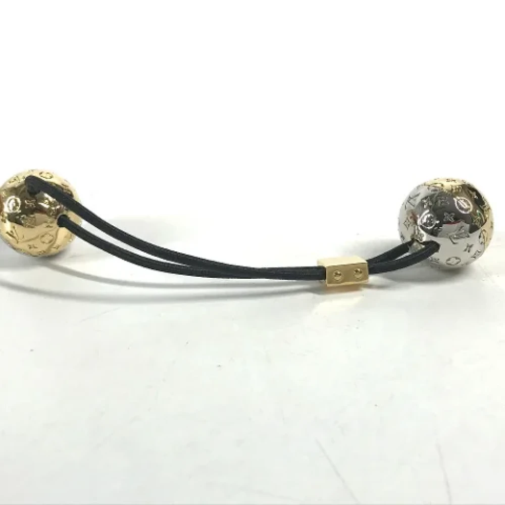Louis Vuitton Vintage Pre-owned Metal hair-accessories Yellow Dames