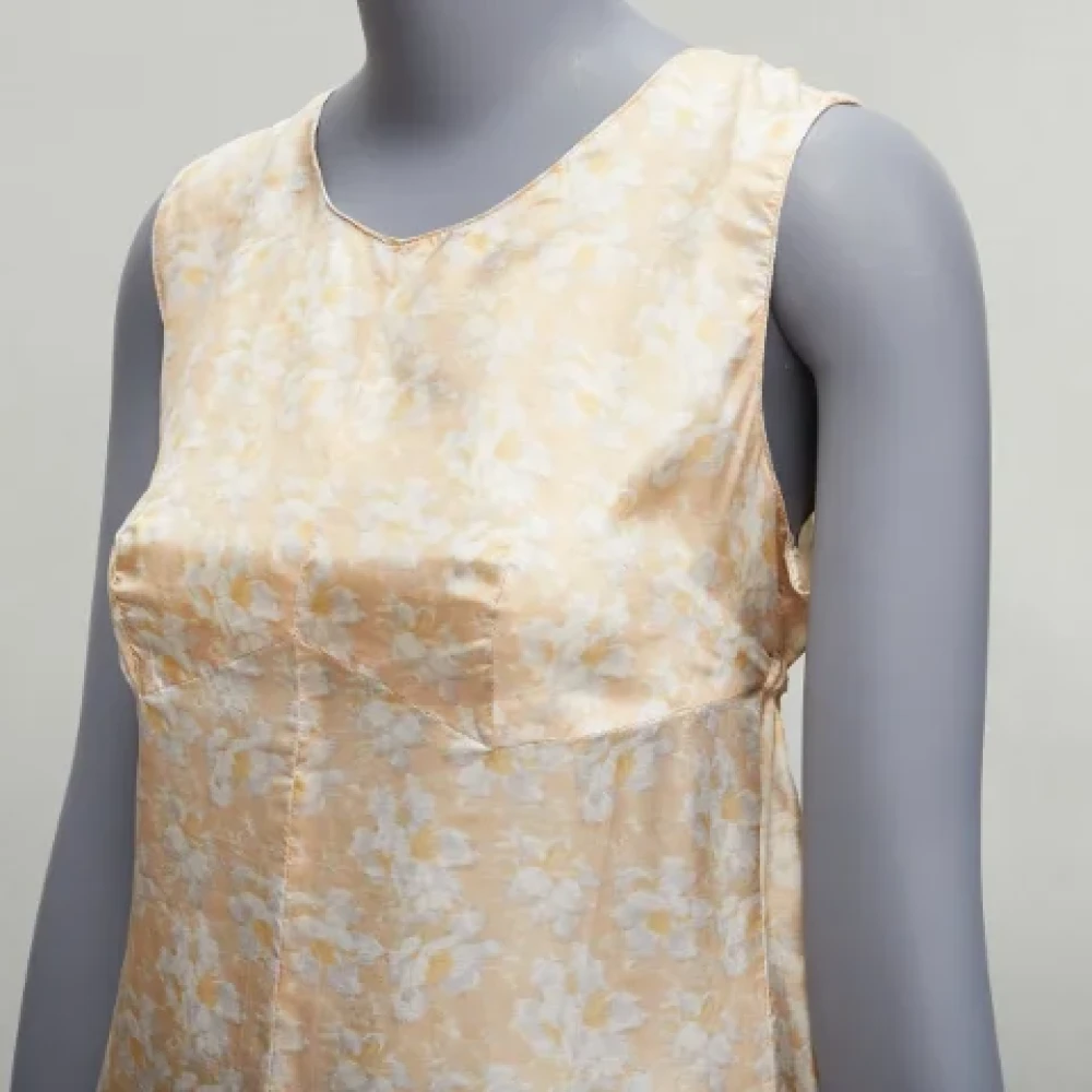 Dries van Noten Pre-owned Silk dresses Beige Dames