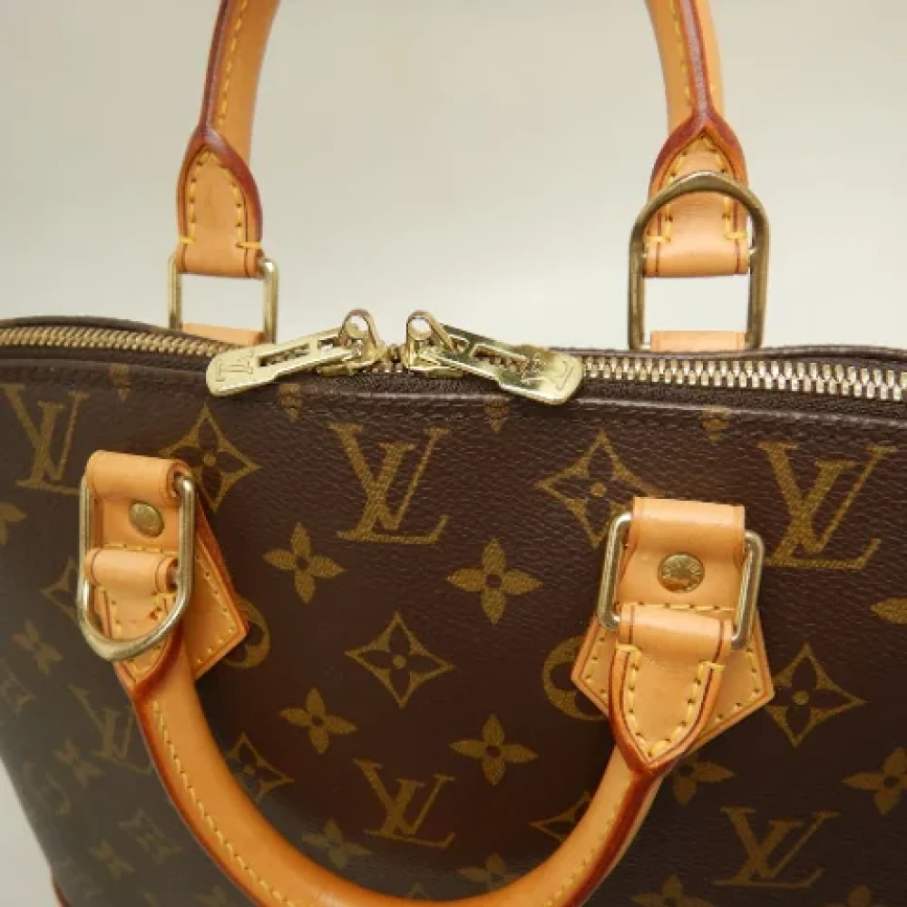 Louis Vuitton Vintage Pre-owned Fabric handbags Brown Dames