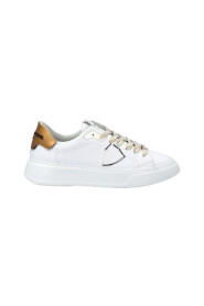 Eleganta vita och guldiga sneakers för kvinnor