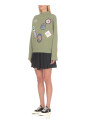 pull-en-coton-vert-avec-badges