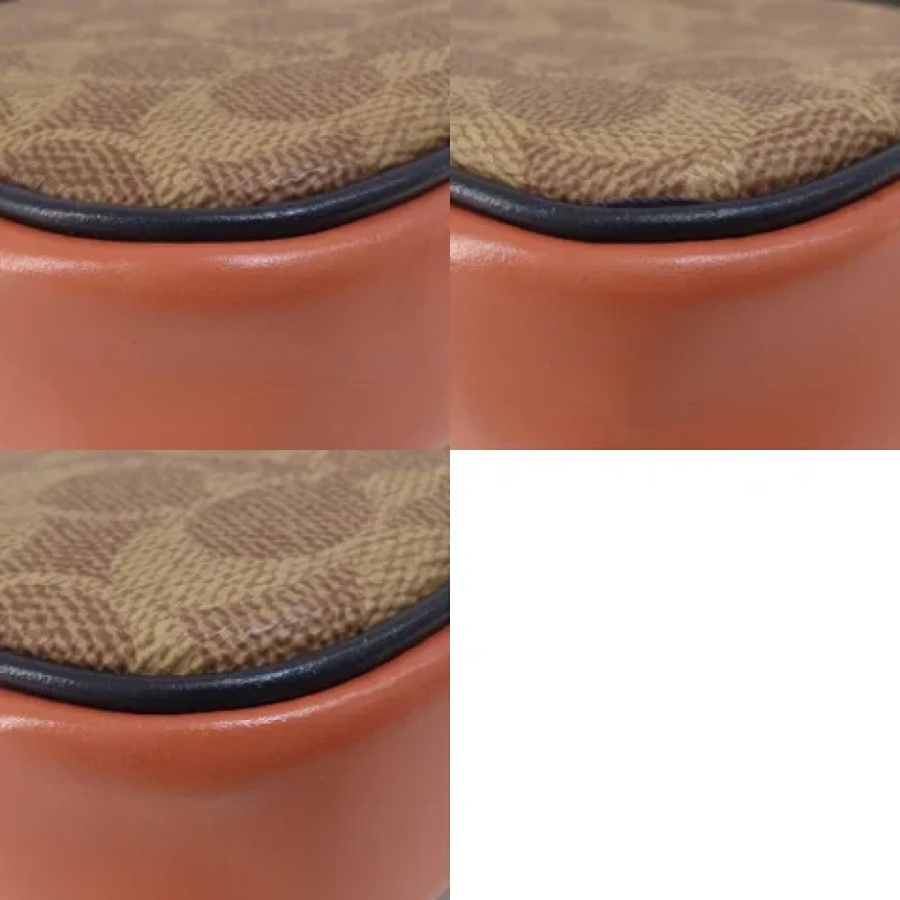 Coach Pre-owned Plastic shoulder-bags Brown Dames