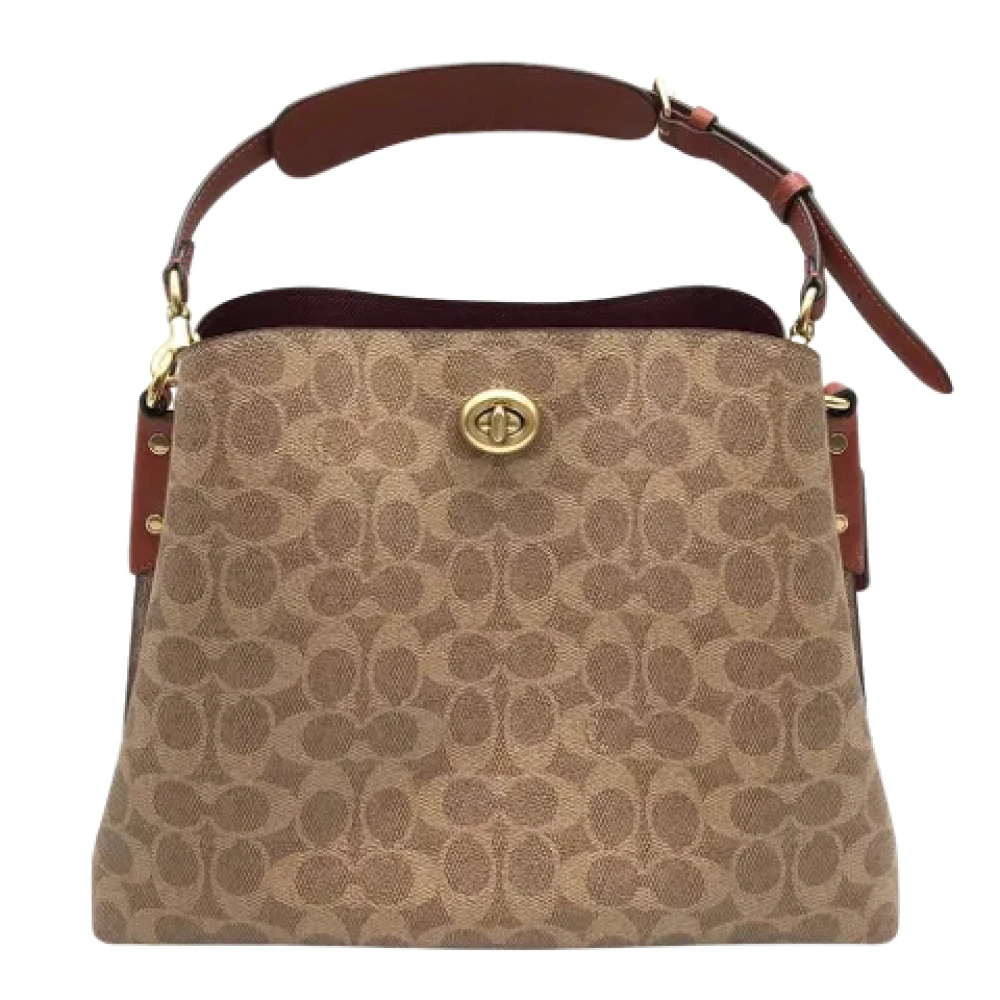 Coach Pre-owned Plastic shoulder-bags Brown Dames