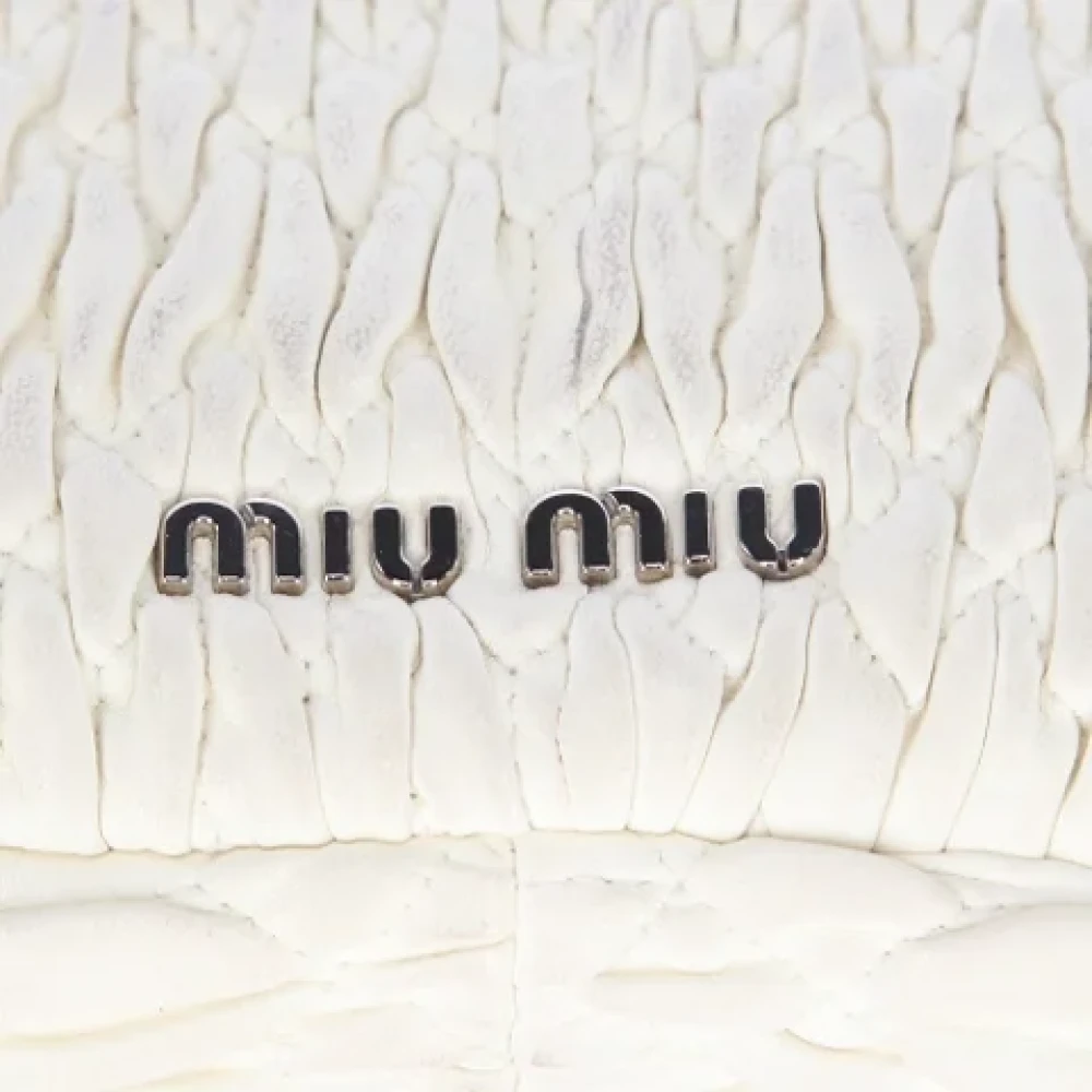 Miu Pre-owned Leather clutches White Dames