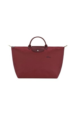 sac-de-voyage-vert-avec-bouton-pression-et-fermeture-eclair