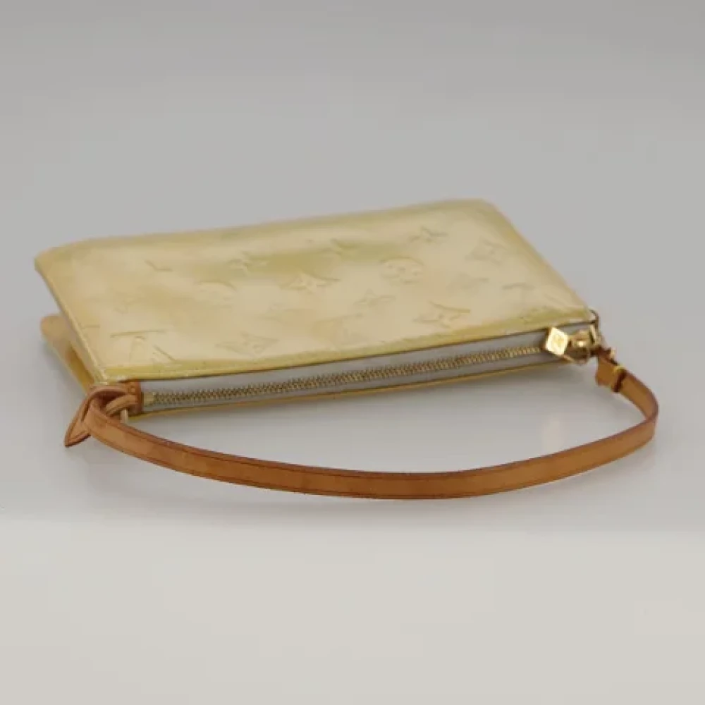 Louis Vuitton Vintage Pre-owned Leather pouches Beige Dames